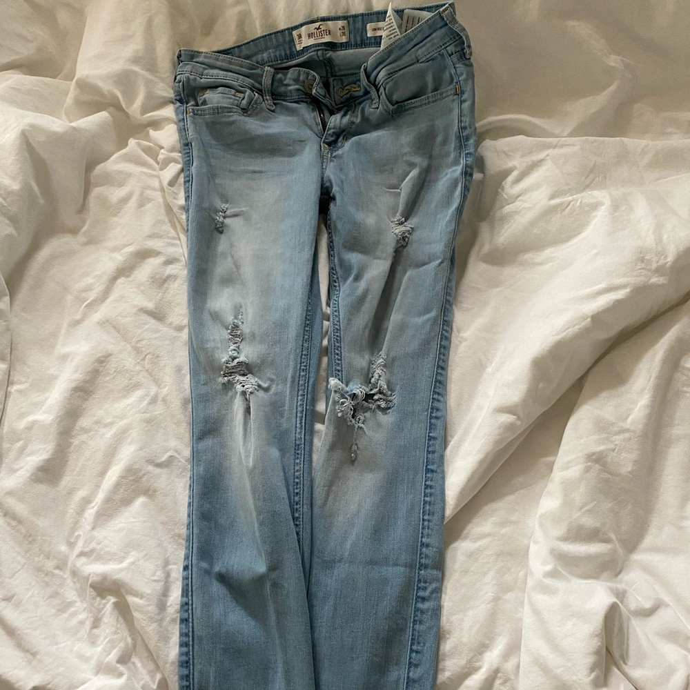 Light blue ripped distressed hollister jeans.